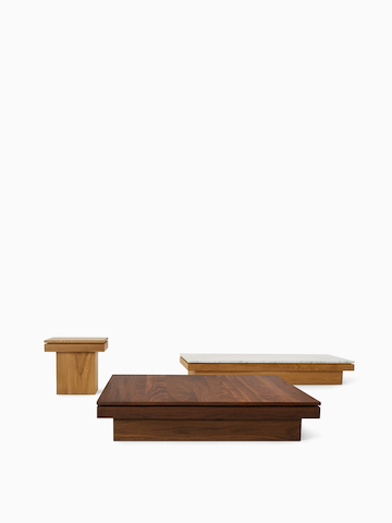 Three Pawson Drift side and coffee tables with walnut and oak wood finishes.