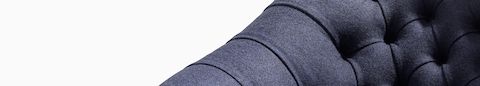 A close-up view of blue fabric on a Rohde Easy Chair.