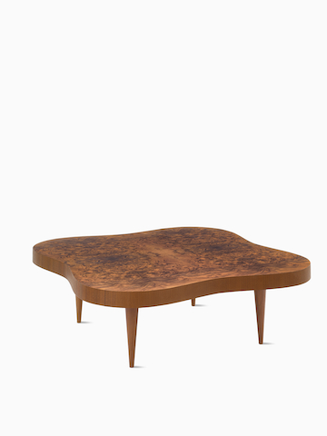 A front view of a Rohde Paldao coffee table in walnut burl.