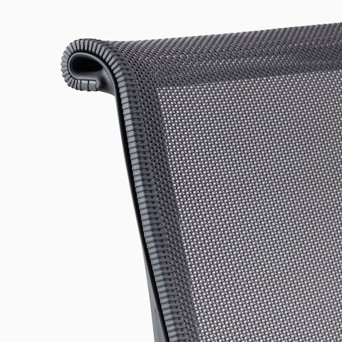 A close-up view of the bumper on a gray Setu chair.