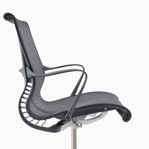A close-up side view of a Setu chair with arms in gray.