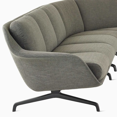 A Striad Modular Three-Seat Sofa with wedge in dark grey.