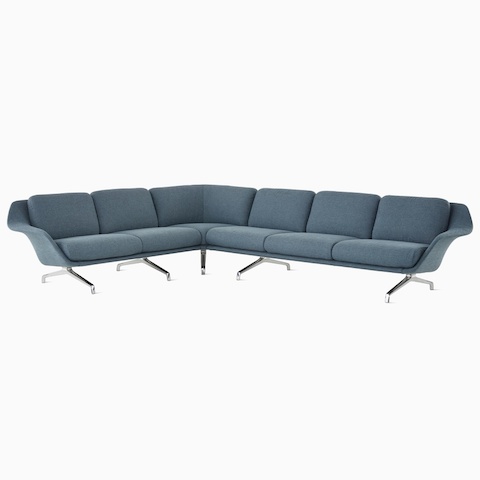 A Striad Modular Three-Seat Sofa with corner in dark blue.