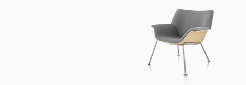 Gray Swoop lounge chair with an exposed wood shell, viewed from a 45-degree angle.