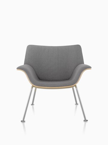 A gray Swoop Plywood Lounge Chair.