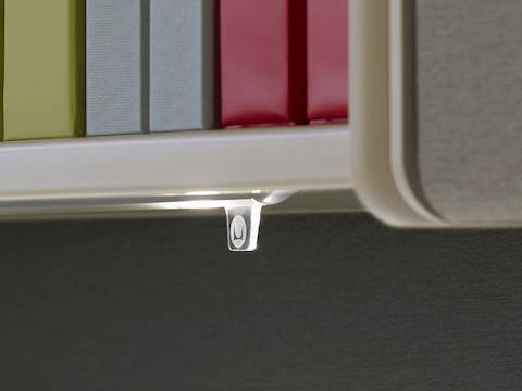 Close view of the illumination-control tab on a Twist LED Task Light.