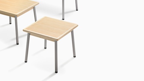 Overhead view of Valor Tables with a light wood finish.