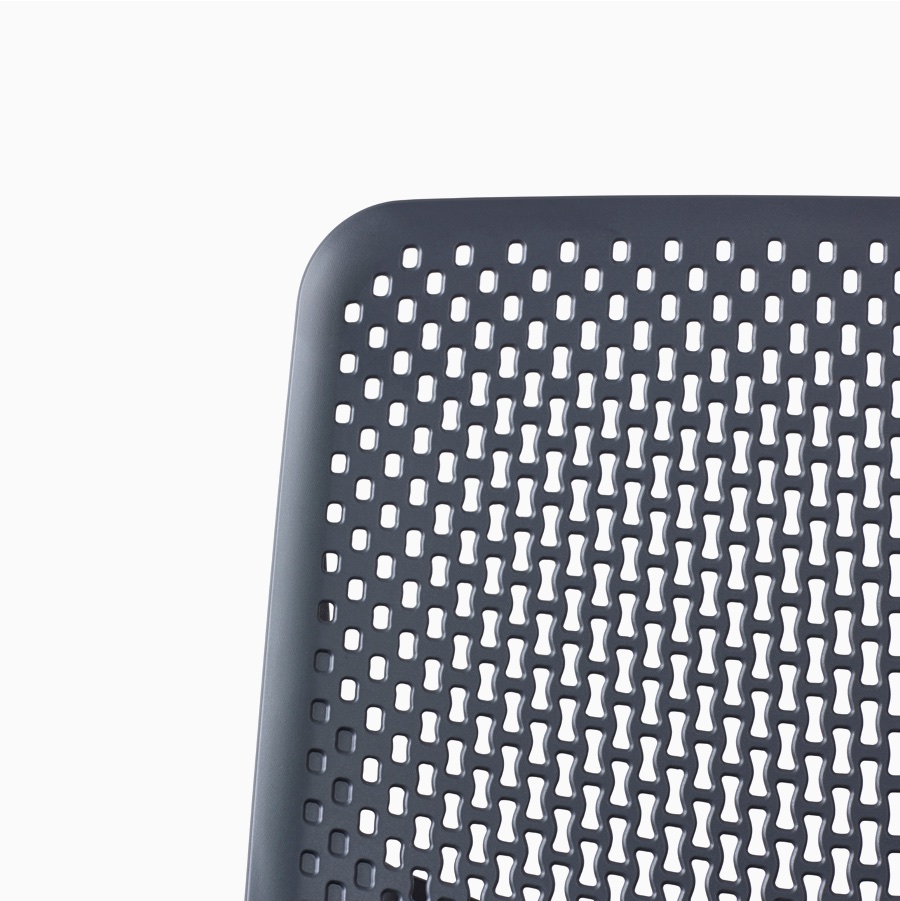 A close-up view of a Verus Chair's black Triflex back.