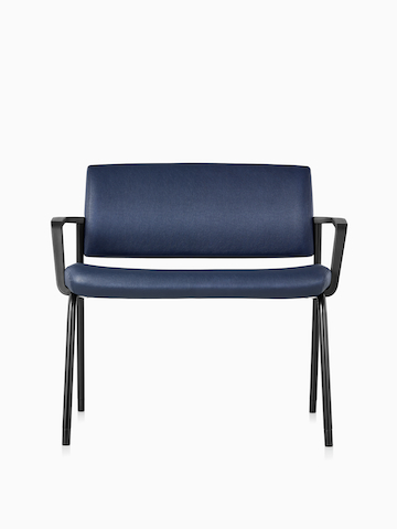 Front view of a Verus Plus Chair with arms upholstered in blue vinyl.