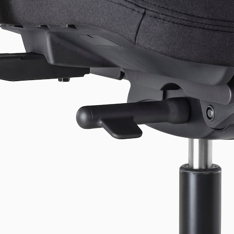 A close-up view of a Verus Stool's black adjustment knob.