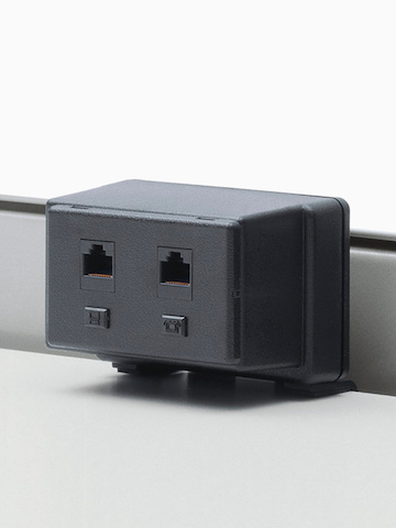 A Connect Voice/Data Outlet with two connection points. Select to go to the Voice/Data Outlet product page.