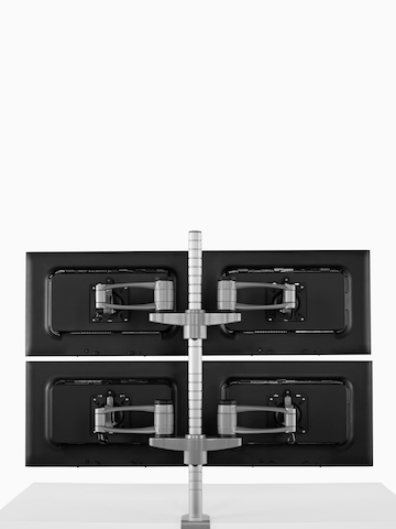 Two monitors attached to Wishbone Dual Monitor Arms. Select to go to the Wishbone Monitor Arms product page.