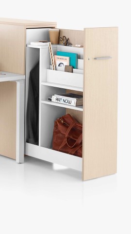 A vertical Tu Storage unit, open to reveal the contents. Select to go to the storage landing page. 