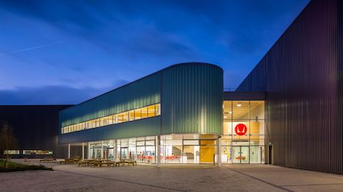 An outdoor photograph of the Herman Miller factory in Melksham, Wiltshire.