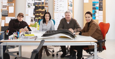 The four principals of industrial design firm Studio 7.5 in Berlin sit on Mirra 2 Chairs.