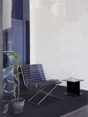 A Ward Bennett Sled chair upholstered in Blocks.